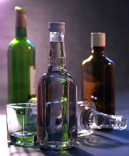 Empty alcohol bottles and glass